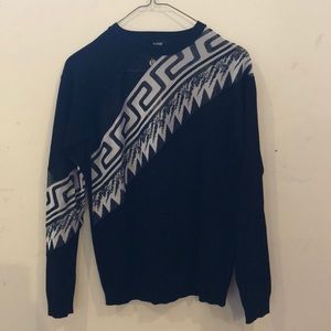 Versus asymmetrical graphic sweater.